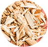 Fine wood chips processed by powerful wood chipping equipment.
