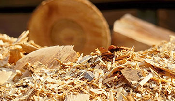 Small wood chips discarded after processing logs